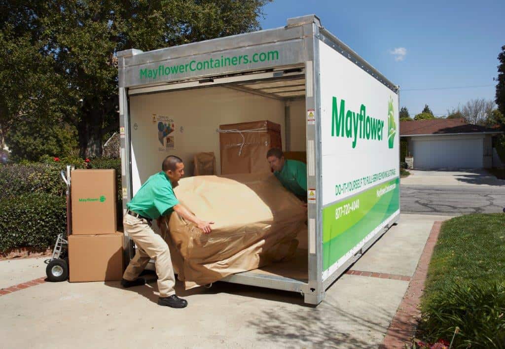 mayflower portable container being loaded by professional movers